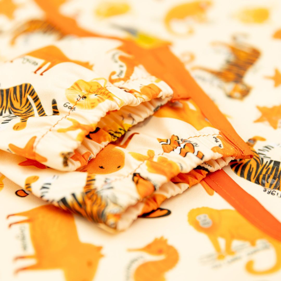 Babero Manga Larga 2- 4 años– Naranja 🍊